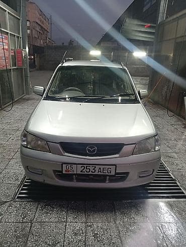 Mazda Demio: 1997 г., 1.5 л, Механика, Газ, Универсал — 1