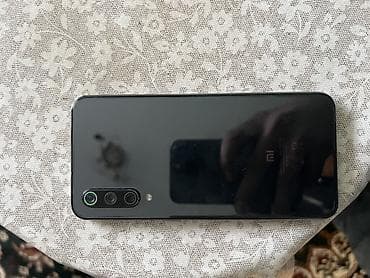 redmi note 7 купить в рассрочку: Xiaomi, Mi 9 SE, 64 ГБ, цвет - Черный, 2 SIM — 1