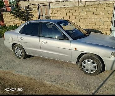 дайхатсу сирен: Daewoo Nubira: 1999 г., Автомат — 3
