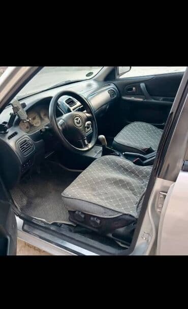 продаю или меняю с доплатой мне: Mazda 323: 2002 г., 1.6 л, Механика, Бензин, Универсал — 1