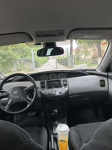 Nissan Primera: 2002 г., 2 л, Вариатор, Бензин, Универсал — 8