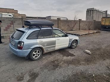 Mazda: Mazda 323: 2001 г., 1.6 л, Механика, Бензин, Универсал — 5