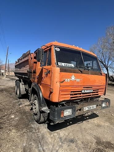 КамАЗ самосвал, оранжевый, колесная формула 6x4. Основные