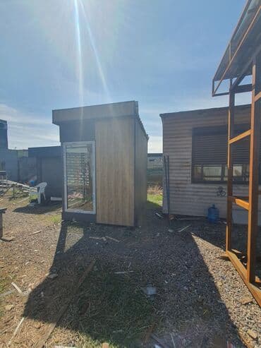 селекция дом куплю: Небольшой павильон прямоугольной формы с отделкой под дерево и серыми — 3