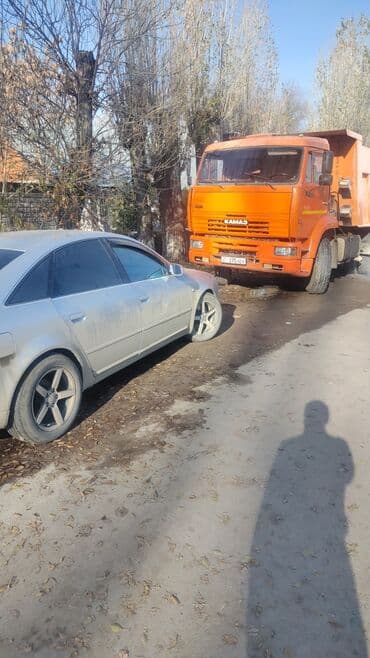 бетономешалка запчасть: Самосвал КАМАЗ 6520 (6x4), оранжевый. Характеристики и возможности: - — 2