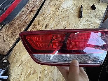 led свет: Стоп сигнал Киа К5 Описание: - Комбинированный задний фонарь: секции — 4
