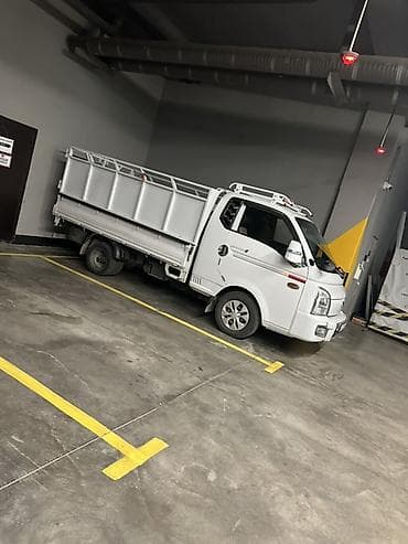 Курьердин жеткирүүсү: Компактный бортовой малотоннажный грузовик с однорядной кабиной — 1