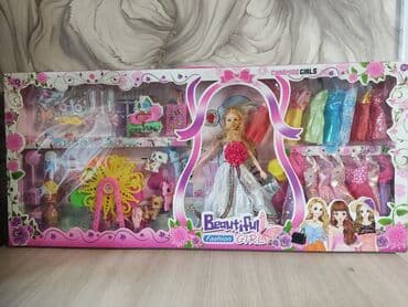 Игрушка кукла с платьями и аксессуароми