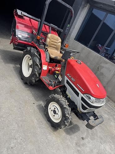 Мини-тракторы YANMAR: Мини-трактор Yanmar Ke-16 с почвофрезой Yanmar Описание: - Компактный — 1