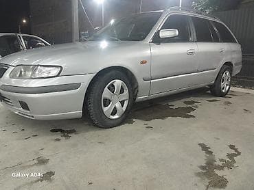 p 12: Mazda Capella: 1999 г., 0.2 л, Механика, Бензин, Универсал — 4