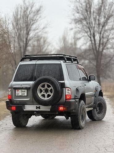 kia carneval: Nissan Patrol: 2003 г., 3 л, Дизель, Внедорожник — 8