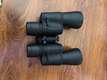 продаю связи с переездом: Бинокль 20x50, поле зрения 87 м/1000 м (направляющая маркировка — 3