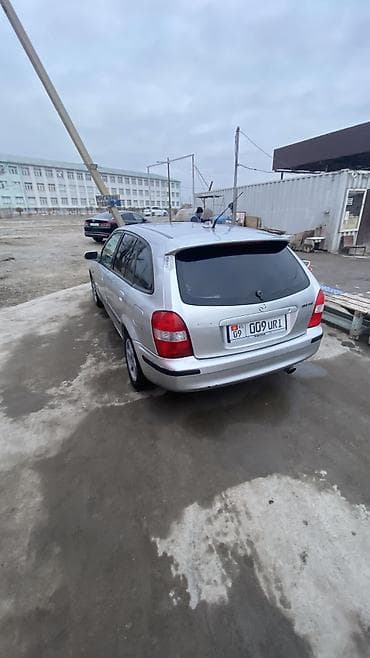 е39 e39: Mazda Familia: 1998 г., 1.6 л, Механика, Бензин, Универсал — 4