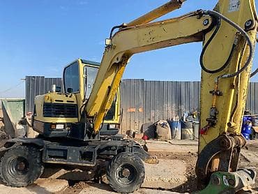 автомобильный пылесос: Экскаватор, 2010 г., Колесный — 6