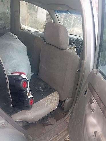 аудио касета: Mazda 2: 2003 г., 1.3 л, Автомат, Бензин, Хэтчбэк — 8