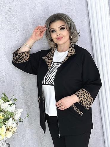 Женская куртка-жакет полуприлегающего кроя с акцентной отделкой. -