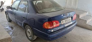 Транспорт: Toyota Corolla: 1995 г., Кол менен иштөөчү, Седан — 3