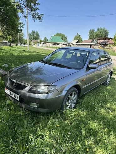 Mazda 323: 2003 г., 1.6 л, Автомат, Бензин, Хэтчбэк