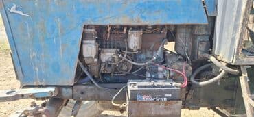 бу шины на трактор: Трактор синего цвета, оснащенный кабиной для оператора, обеспечивающей — 5