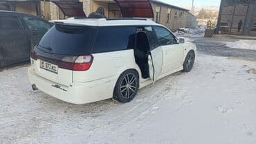 решотки: Subaru Legacy: 2002 г., 2 л, Типтроник, Бензин, Универсал — 6