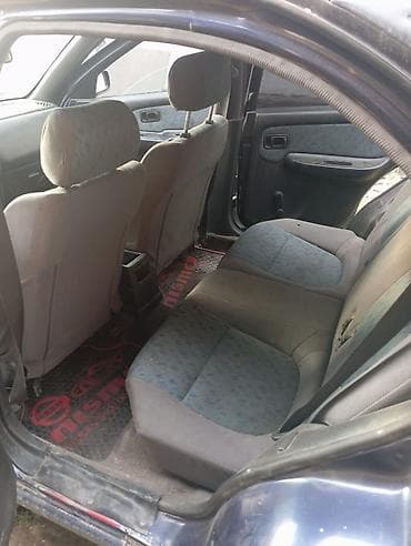 падиомник авто: Nissan Almera: 1997 г., 1.6 л, Механика, Бензин, Хэтчбэк — 7