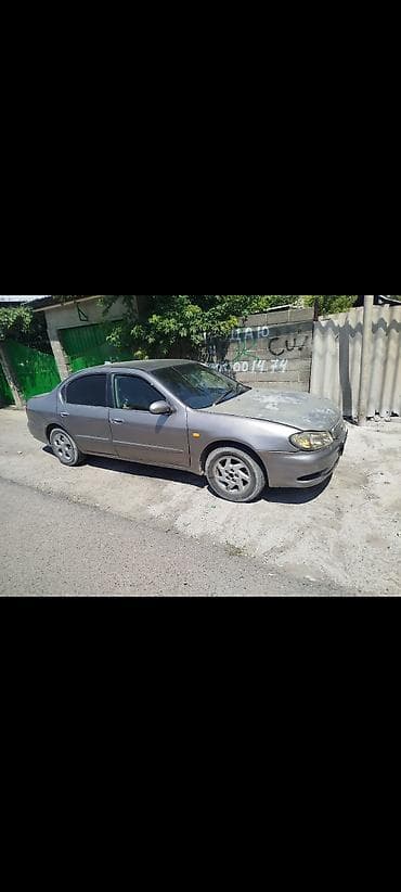 aqua правый: Nissan Sylphy: 1999 г., 2 л, Автомат, Бензин, Седан — 4