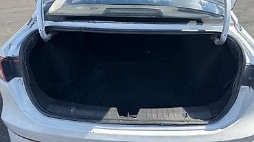 imac 2011: GAC Aion S, белый седан C‑класса на электроприводе. Кузов и дизайн: - — 10