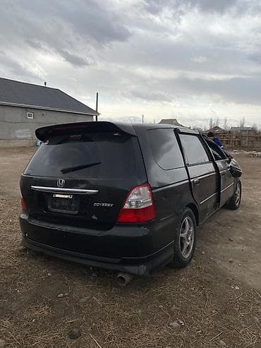 разбитые авто: Honda Odyssey (RA6/RA7) — черный минивэн, левый руль. Бензиновый — 3