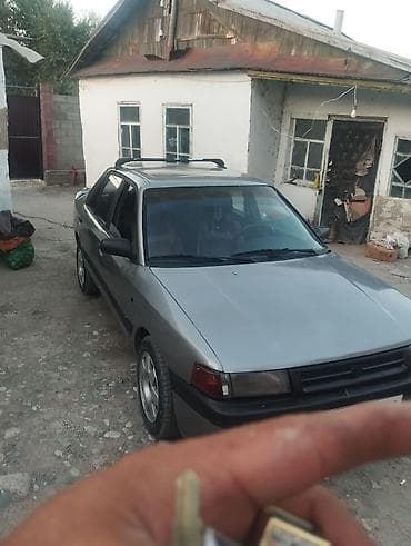 1: Mazda 323: 1989 г., 1.6 л, Механика — 2