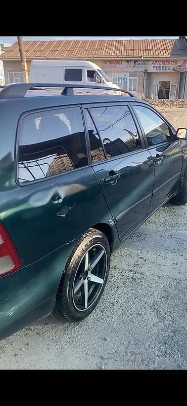 Toyota Corolla: 2003 г., 1.4 л, Механика, Бензин, Универсал