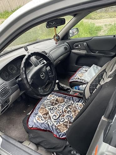 mazda 3: Mazda 323: 2000 г., Механика, Бензин, Универсал — 5