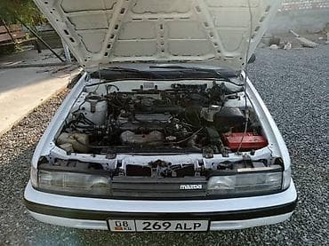 sg 9: Mazda 626: 1988 г., Механика, Бензин, Лифтбек — 2