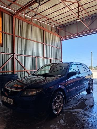 mc 2000: Mazda Familia: 2002 г., 1.6 л, Механика, Бензин, Универсал — 2