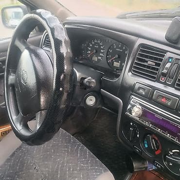Транспорт: Nissan Primera: 1998 г., 1.8 л, Механика, Бензин, Универсал — 9