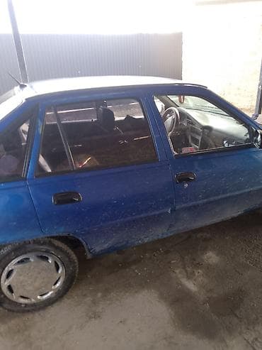 daewo damas: Daewoo Nexia: 2012 г., Бензин, Седан — 5