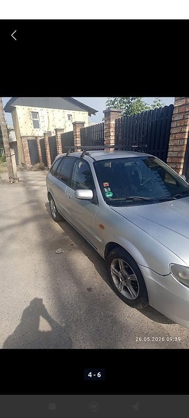 kirgiz auto: Mazda 323: 2002 г., 1.6 л, Механика, Бензин, Хэтчбэк — 4