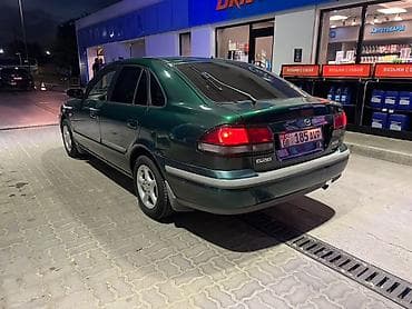 34 bwm: Mazda 626: 1998 г., 1.8 л, Механика, Бензин, Седан — 5