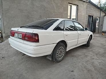 Унаа: Mazda Capella: 1990 г., 2 л, Кол менен иштөөчү, Бензин, Седан — 10