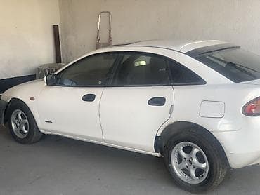 mazda 3: Mazda 323: 1996 г., 1.8 л, Автомат, Бензин, Лифтбек — 2