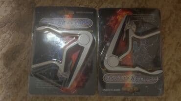 купить гитару в бишкеке бу: Каподастр есть в наличии: металлические и пластиковые . есть доставка — 4