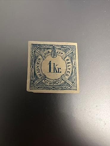 Винтажная почтовая марка с изображением портрета монарха в профиль