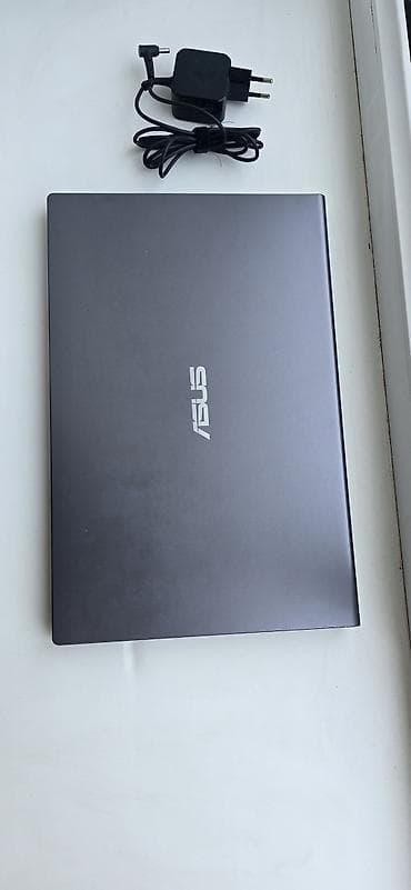 iohone 11: Ноутбук ASUS с зарядным устройством. Характеристики и особенности: - — 1