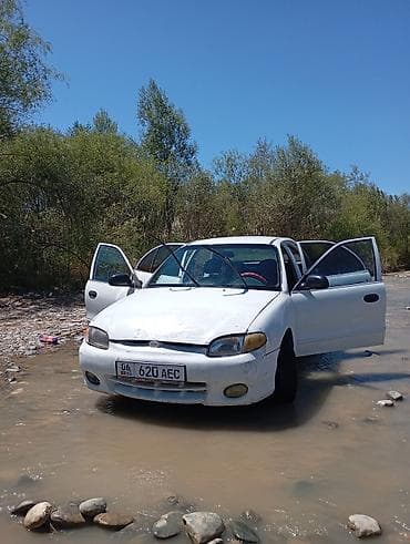 дайхатсу пузар: Daihatsu : 1997 г., 1.3 л, Механика, Бензин, Седан — 1