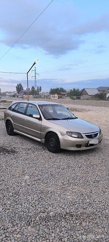 Унаа: Mazda Familia: 2003 г., 1.5 л, Автомат, Бензин, Универсал — 6