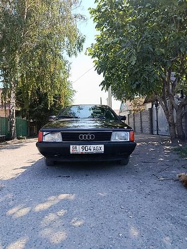 тирактор 80: Audi 100: 1986 г., Седан — 1