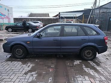 продаю бетономешалки: Mazda 323: 2001 г., 1.6 л, Механика, Бензин, Хэтчбэк — 2