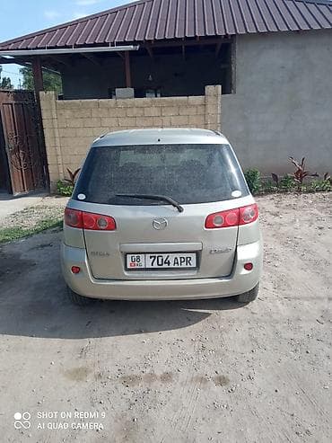 wuling mini ev: Mazda Demio: 2005 г., Автомат, Бензин — 6
