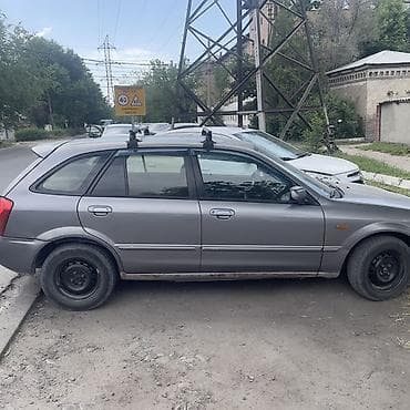auto kg: Mazda 323: 2002 г., 1.6 л, Механика, Бензин, Универсал — 3