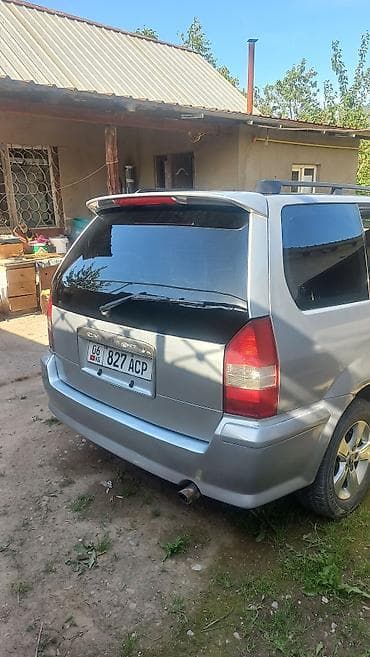 Mitsubishi Chariot: 1999 г., 2.4 л, Механика, Бензин, Минивэн — 8
