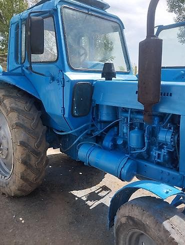 афто лотка: Трактор колесный МТЗ (ориентировочно серии МТЗ-80/82) синего цвета — 2